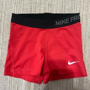 red nike pros
